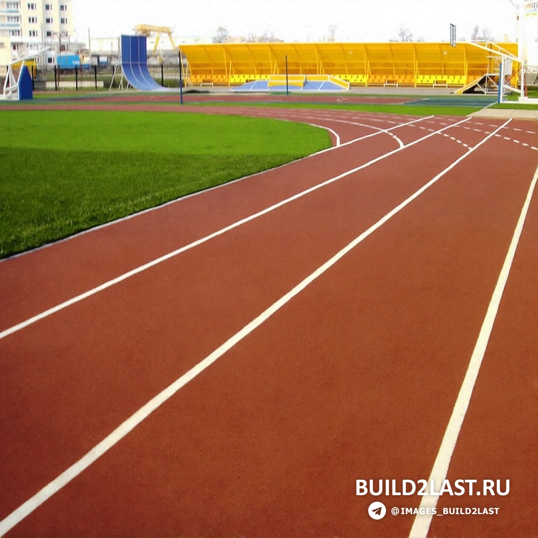 Резиновое покрытие для спортивных сооружений коричневого цвета.